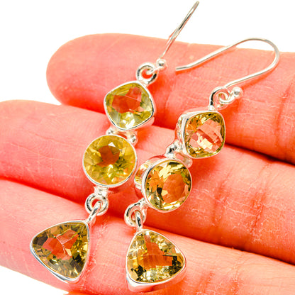Faceted citrine earrings in sterling silver with round and heart yellow gemstone drops