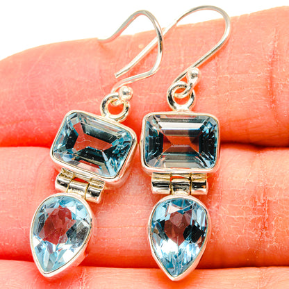 Sterling silver blue topaz drop earrings with rectangular and heart-cut stones