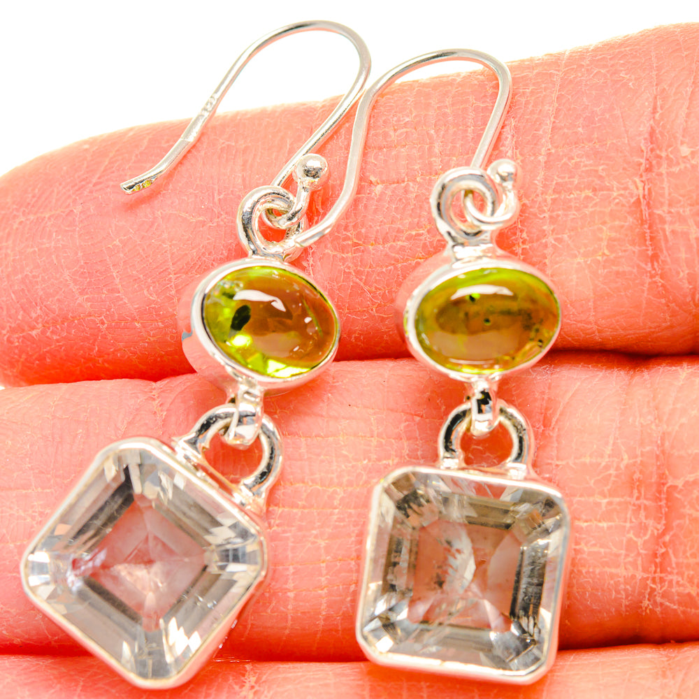 Sterling silver dangle earrings with green oval stones and faceted clear square pendants