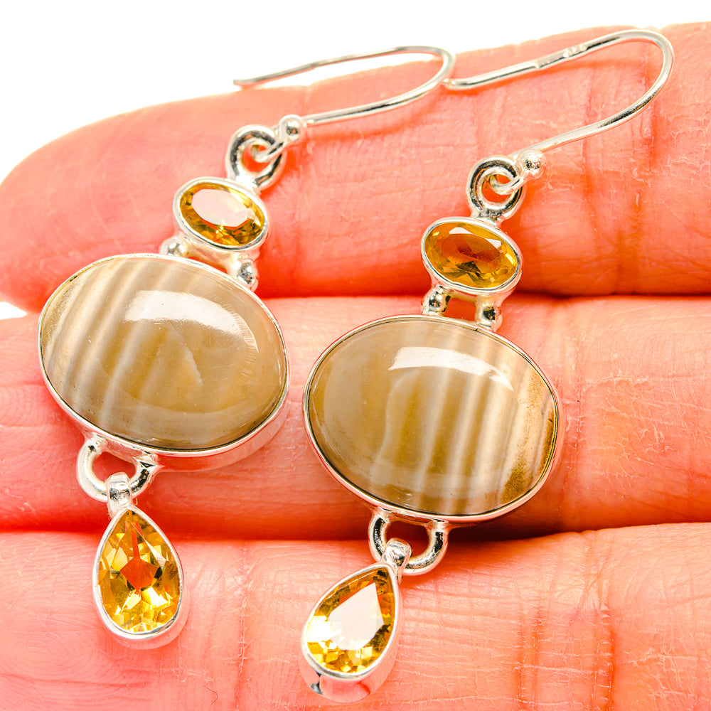 Silver drop earrings with oval yellow jasper cabochons and citrine pear dangles