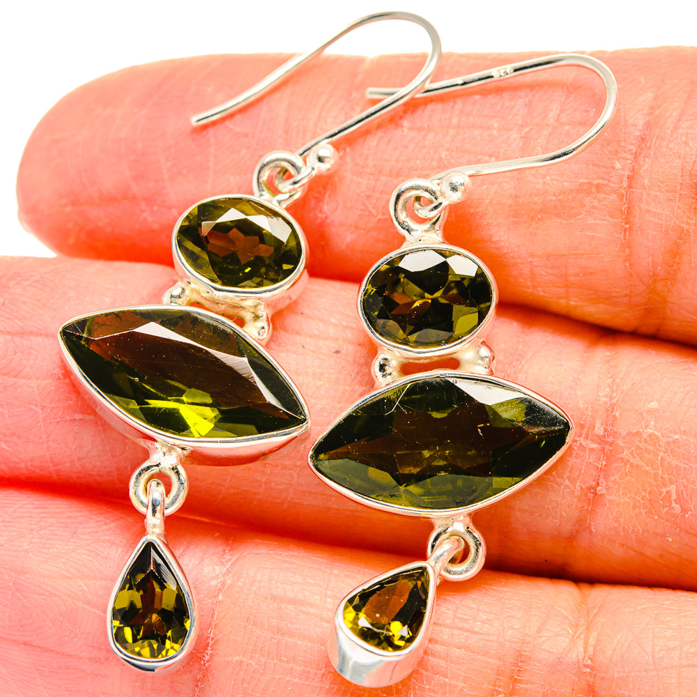 925 sterling silver peridot earrings, leaf-drop design with faceted green stones