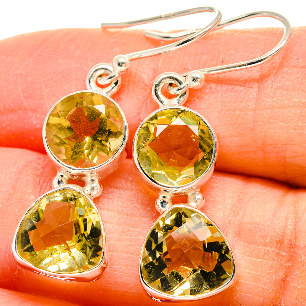 Sterling silver citrine-style drop earrings with faceted round top stones and teardrop bottoms