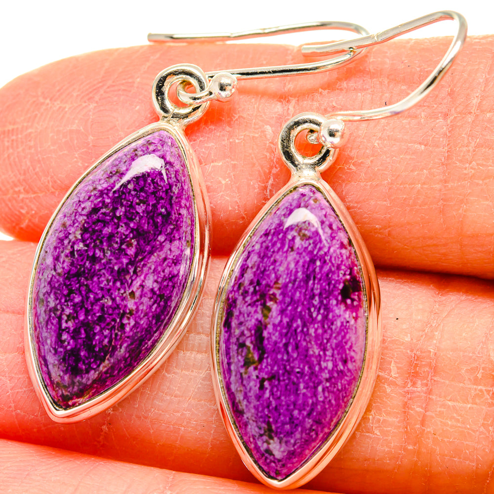 Purple stichtite teardrop earrings in 925 sterling silver, close-up on hook setting