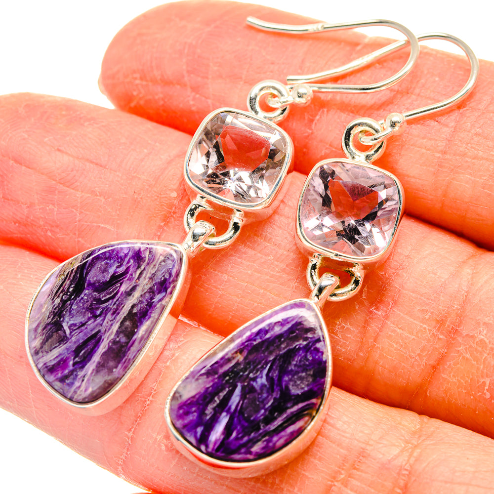 Sterling silver drop earrings with faceted pink stones and purple teardrop charoite close-up