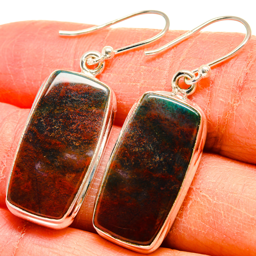 Close-up of rectangular bloodstone cabochon drop earrings, 925 sterling silver