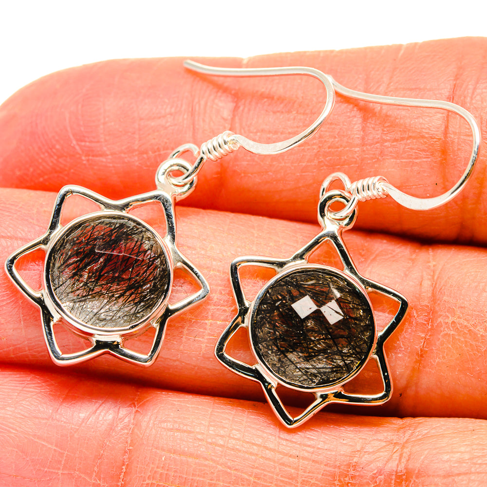 Sterling silver drop earrings with round black tourmalinated quartz in star frame