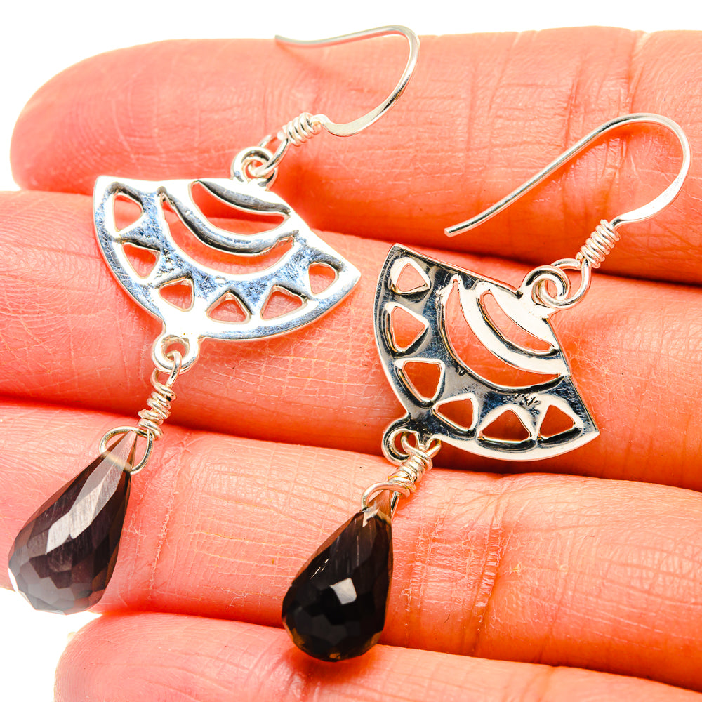 Sterling silver geometric earrings with smoky quartz drops and blue-orange enamel detail