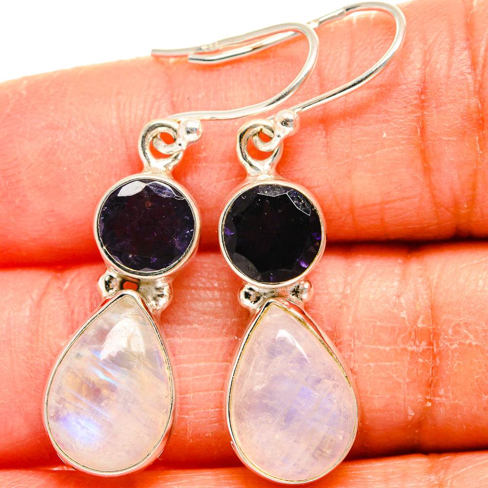 Sterling silver drop earrings with dark purple round stones and opalescent pear moonstone drops