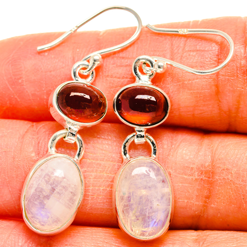 Sterling silver drop earrings with dark red oval top and pale opal oval bottom