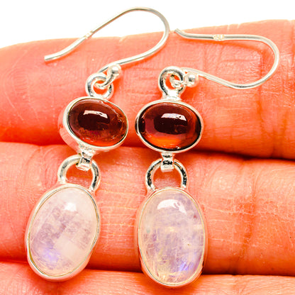 Sterling silver drop earrings with dark red oval top and pale opal oval bottom