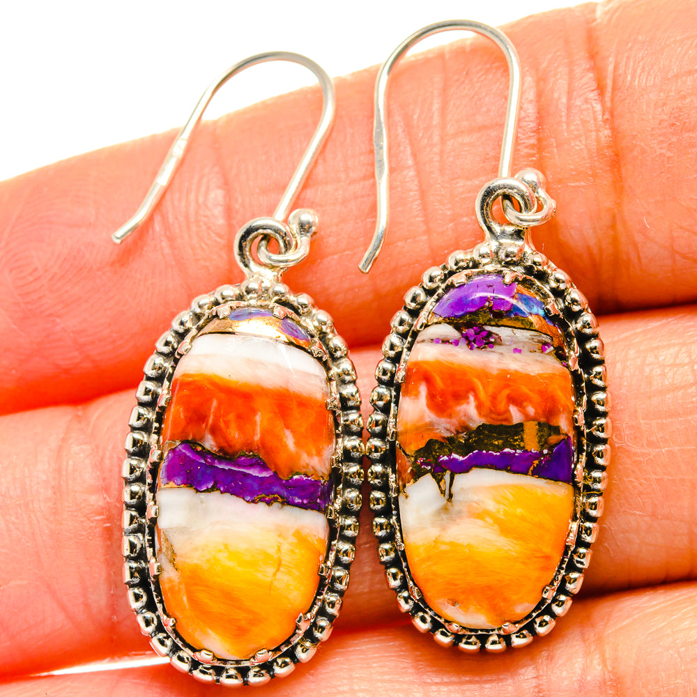Close-up oval multicolor jasper drop earrings, 925 sterling silver beaded bezel.