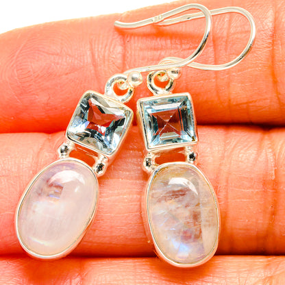 Sterling silver earrings with blue square topaz and oval rainbow moonstone drops
