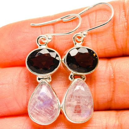 Sterling silver drop earrings with black round stones and pink pear moonstones