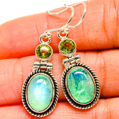 Sterling silver dangle earrings with oval green-blue opal and round peridot accents