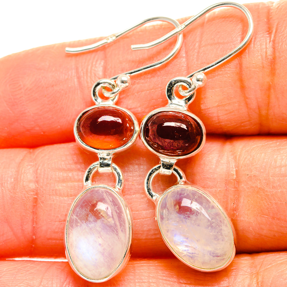 Sterling silver drop earrings with dark red garnet and pale opal moonstone oval dangles
