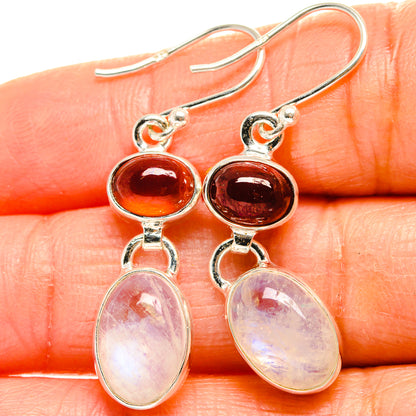 Sterling silver drop earrings with dark red garnet and pale opal moonstone oval dangles