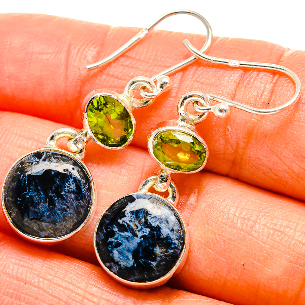 Sterling silver drop earrings with green peridot and blue pietersite round stones