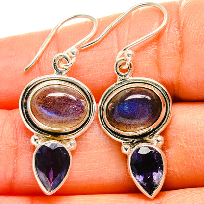 Sterling silver dangle earrings with round labradorite bezel and deep blue pear stones