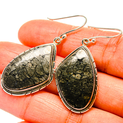 Teardrop pyrite agate drop earrings with textured black-and-gold stone and silver bezels