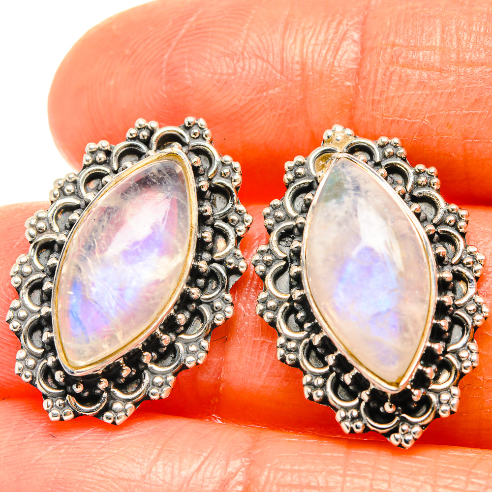 Oval rainbow moonstone stud earrings in ornate 925 sterling silver bezel
