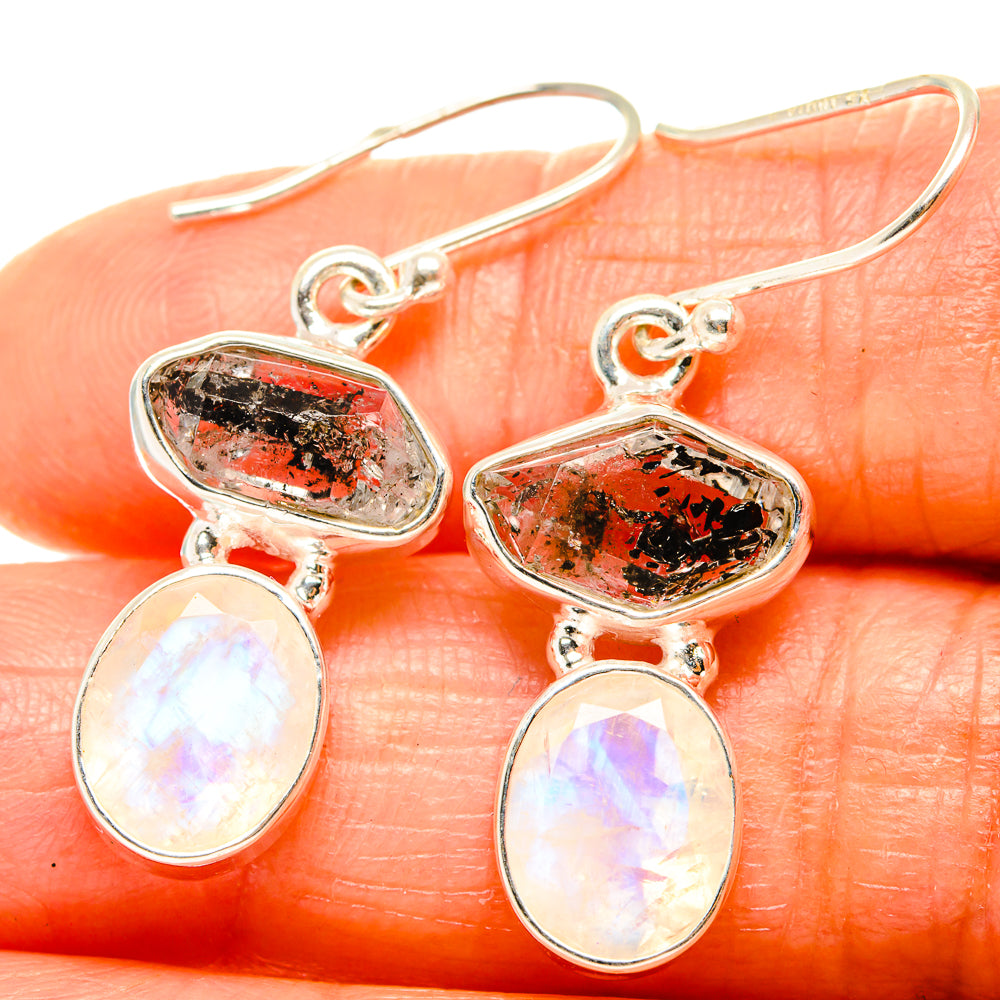 Sterling silver drop earrings with red-speckled oval stones and white opal-like teardrops