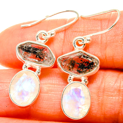 Sterling silver drop earrings with red-speckled oval stones and white opal-like teardrops