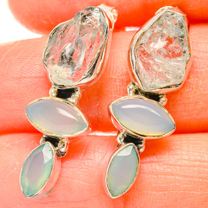 Gold-tone rough quartz earrings with gray-white oval and green aqua teardrop cabochon