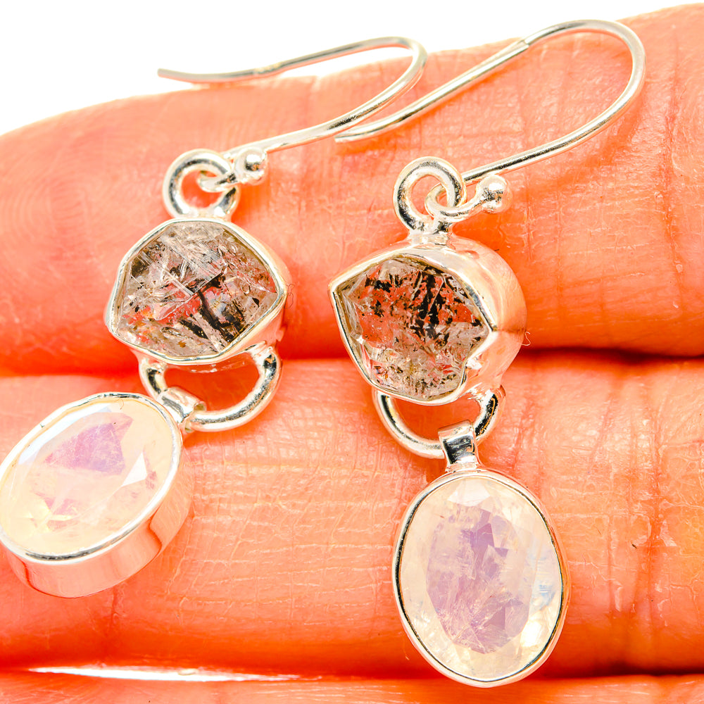Sterling silver earrings with faceted Herkimer-style tops and opal-like oval drops
