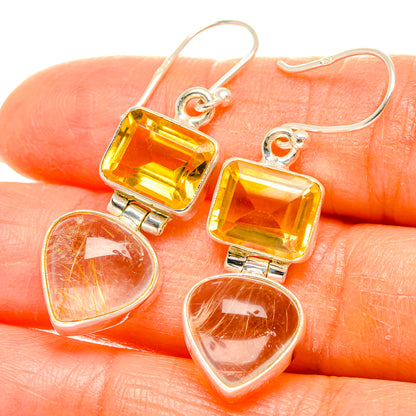 Silver-tone earrings with square citrine stones and rutilated heart drops