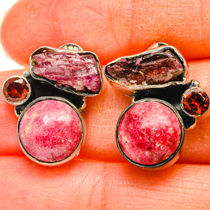 Silver gemstone earrings with round pink stone, pink rough cabochon, and garnet accents
