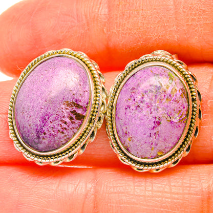 Stichtite gemstone stud earrings with oval purple stone and braided gold-tone borders