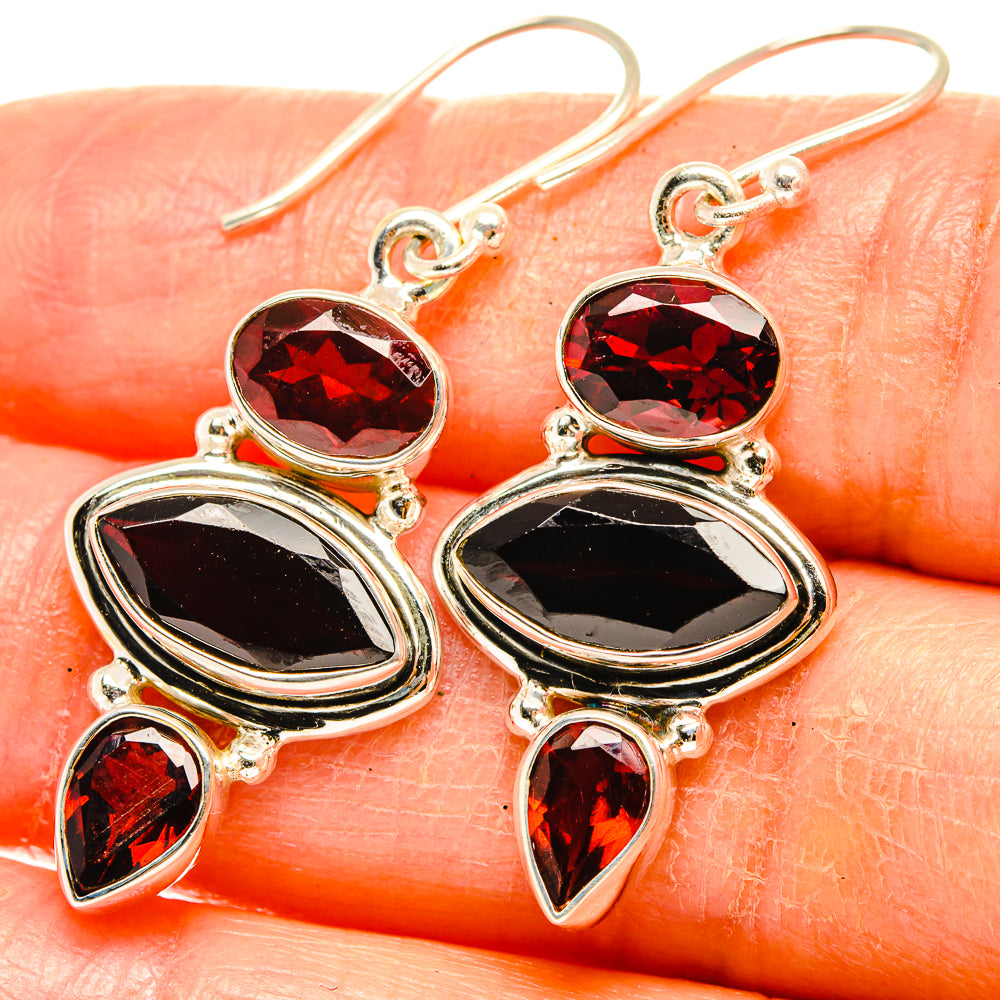 925 sterling silver garnet earrings with dark red oval stones and teardrop accents