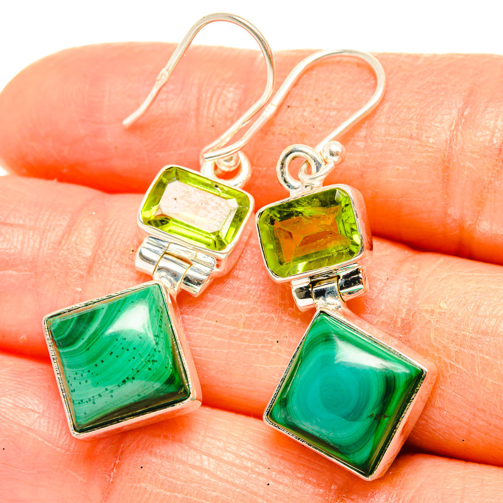 Green gemstone drop earrings close-up on hand, mixed malachite and peridot squares