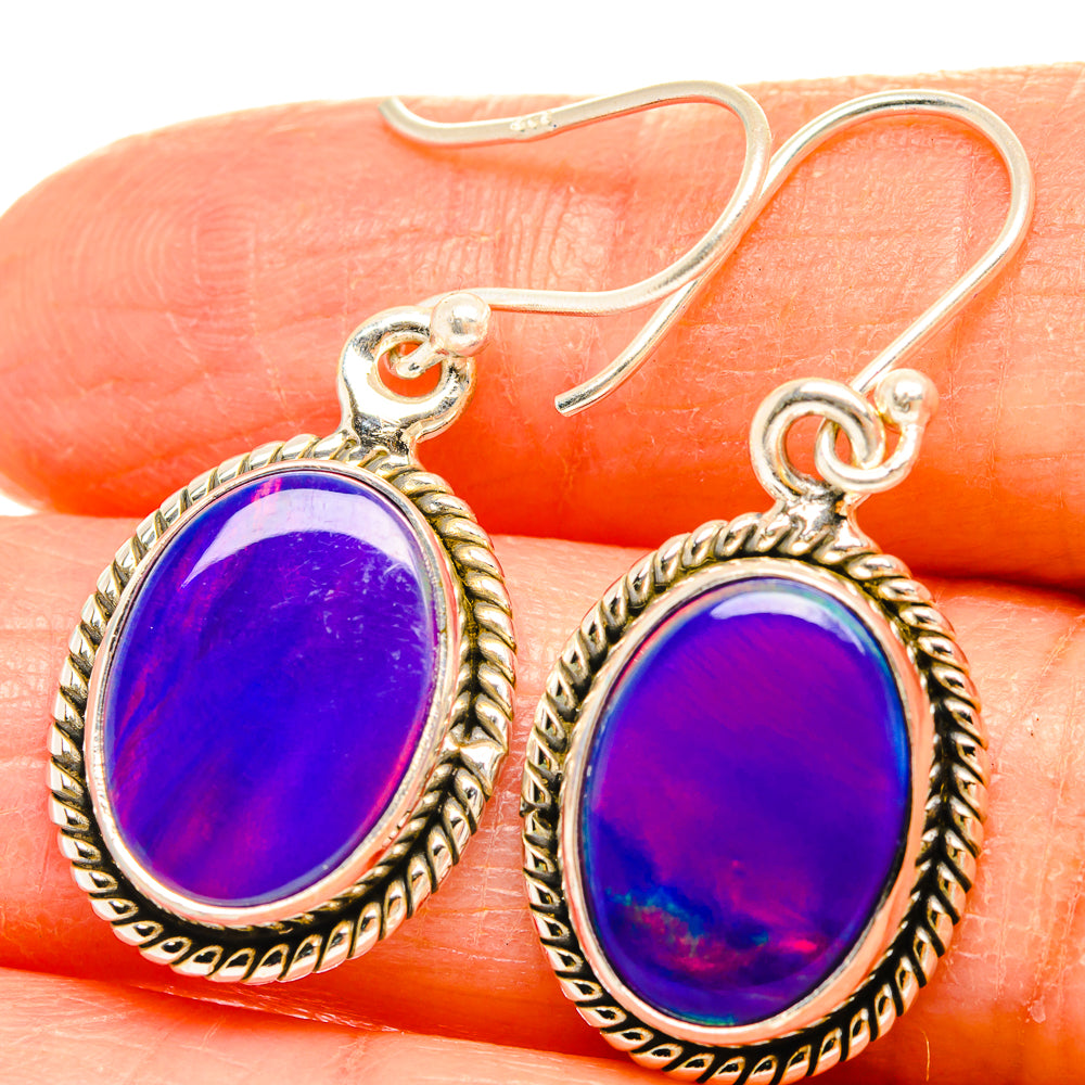 Oval purple opal drop earrings in 925 sterling silver with hooked backs