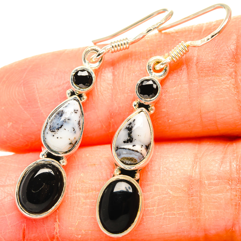 Sterling silver drop earrings, black onyx and white dendritic opal oval stones