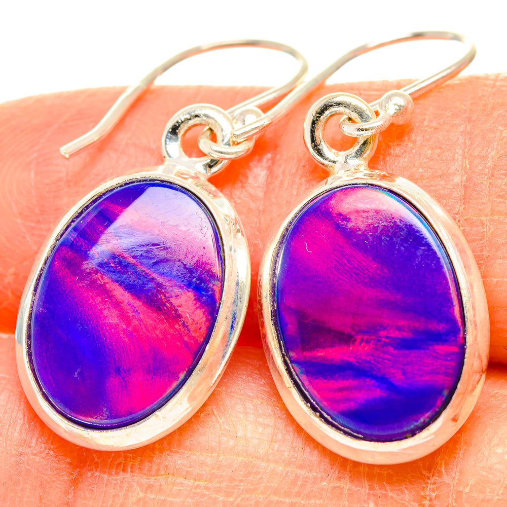 Sterling silver oval drop earrings with magenta-purple iridescent opal cabochon