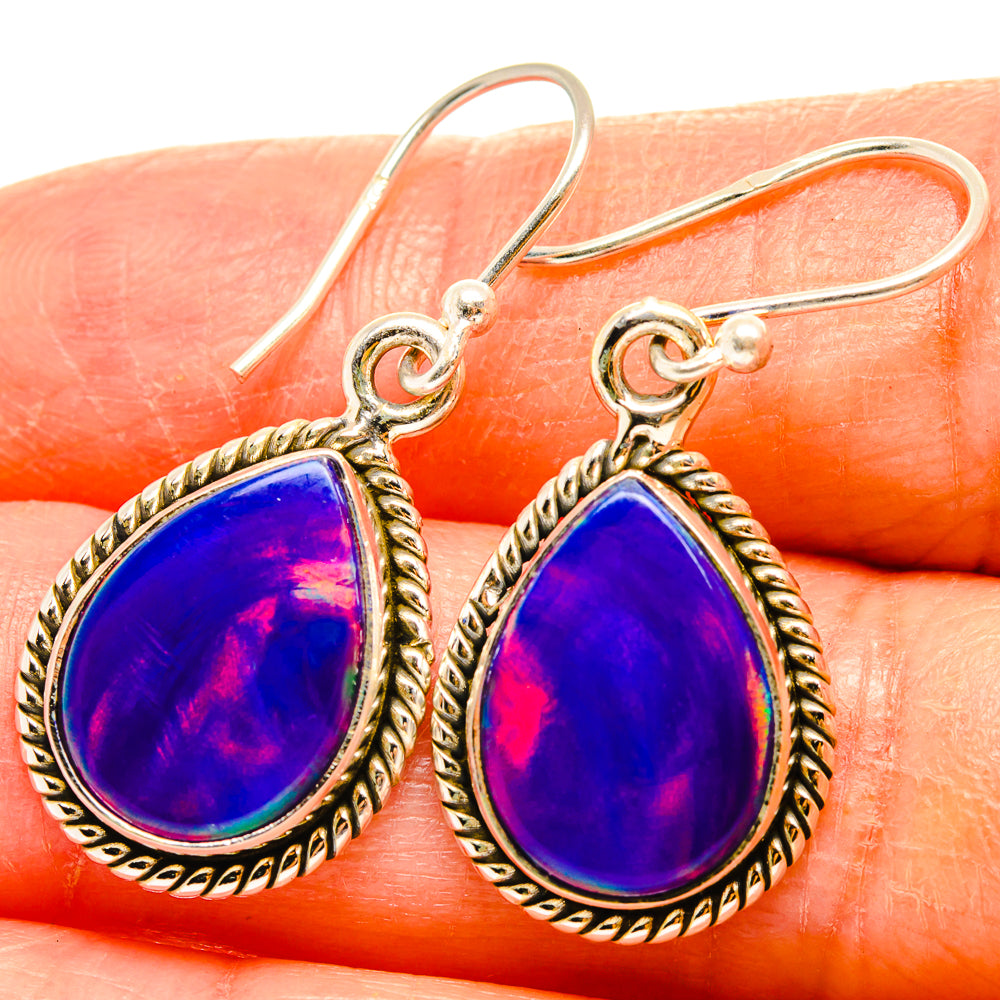 Teardrop opal earrings with blue-purple stones and rope-edged 925 silver hooks