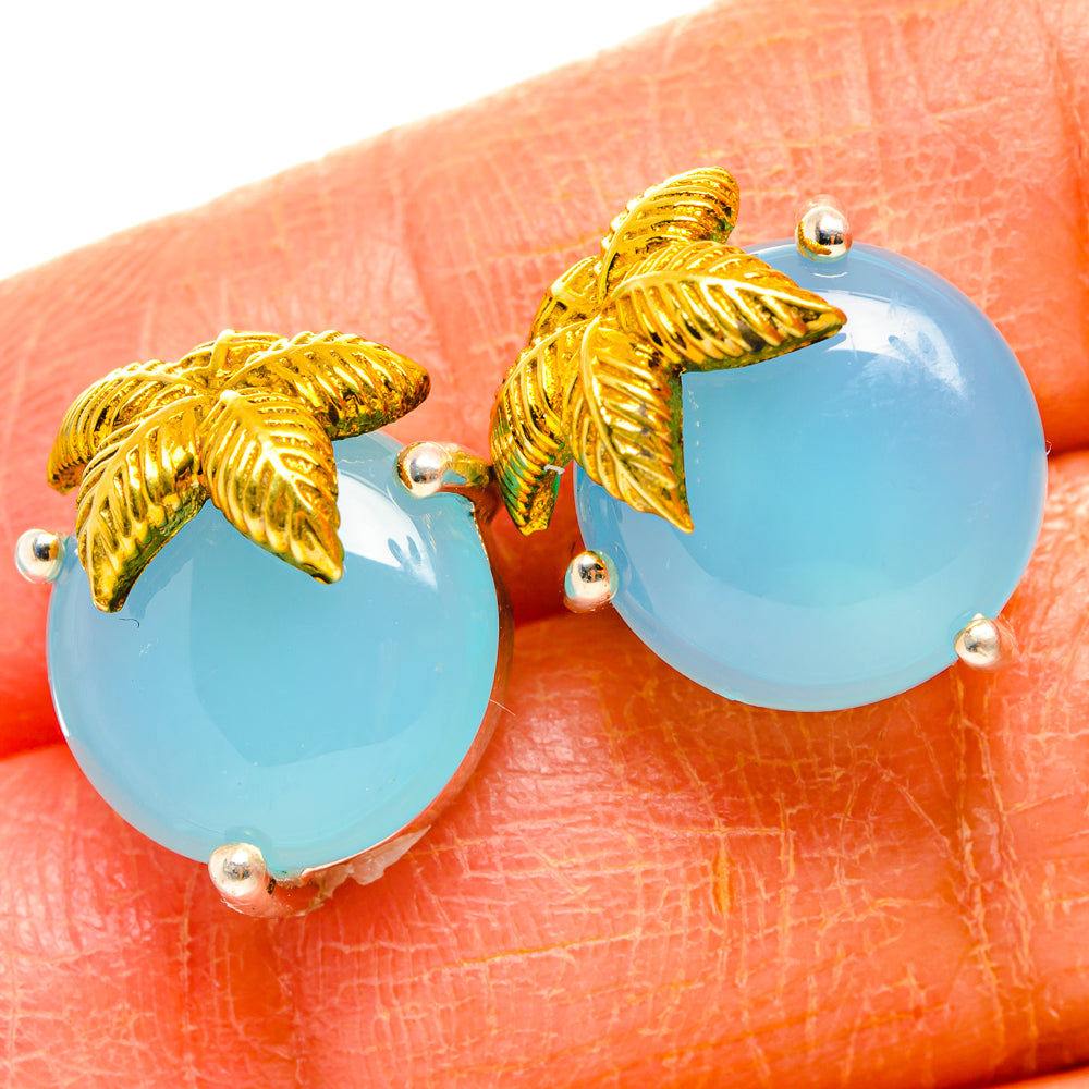 Aqua chalcedony stud earrings with gold-tone leaf settings and 925 sterling silver posts