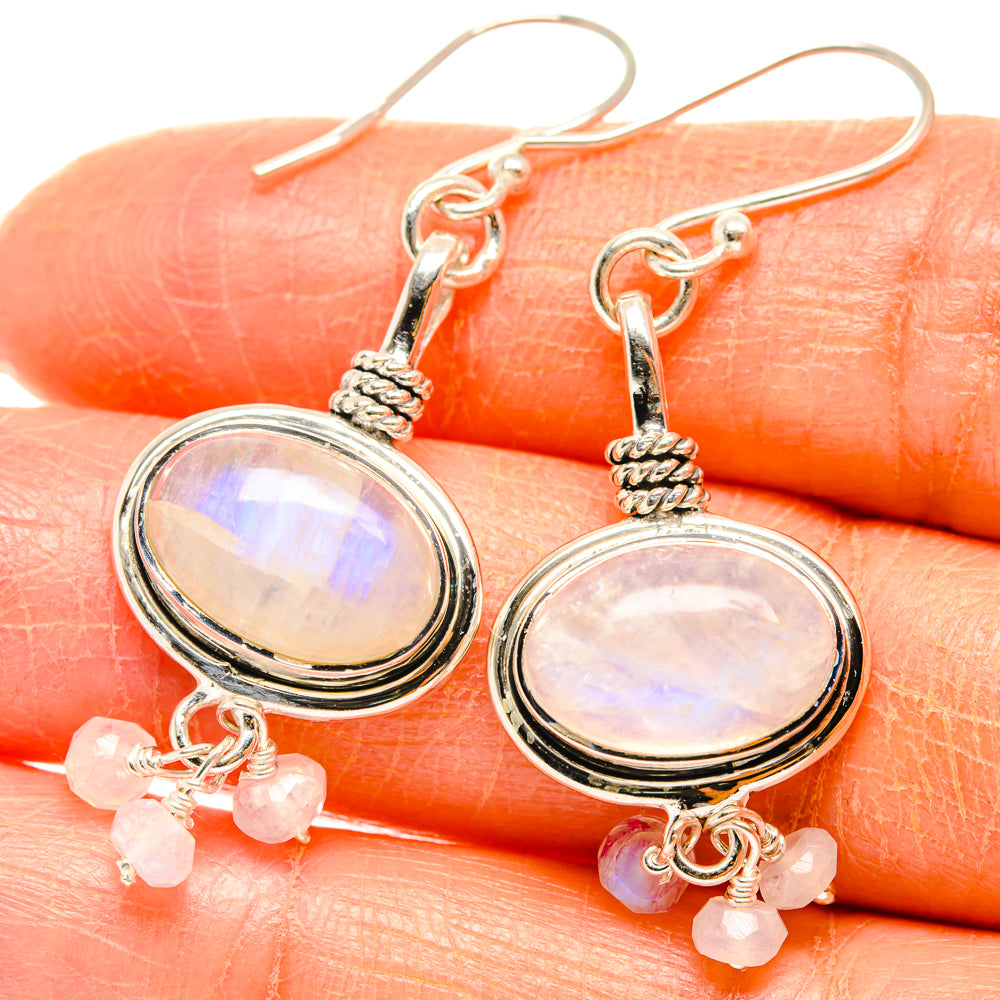 Oval iridescent moonstone earrings in 925 sterling silver with white bead dangles