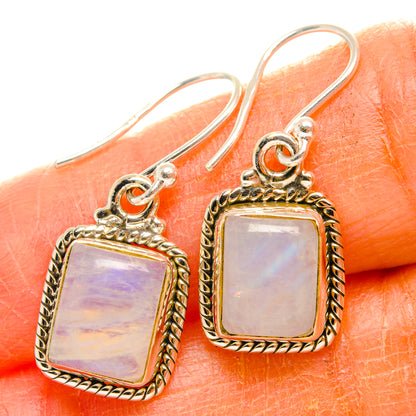 Moonstone drop earrings, square silver-framed iridescent stones on lever hooks