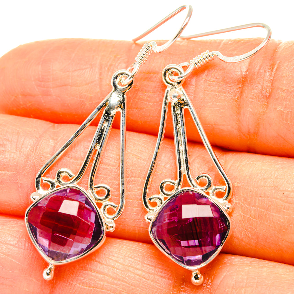 Sterling silver amethyst drop earrings with faceted purple stones and filigree frames