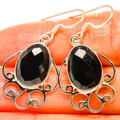 Black onyx teardrop earrings with ornate silver filigree and hook backs, 925 sterling.