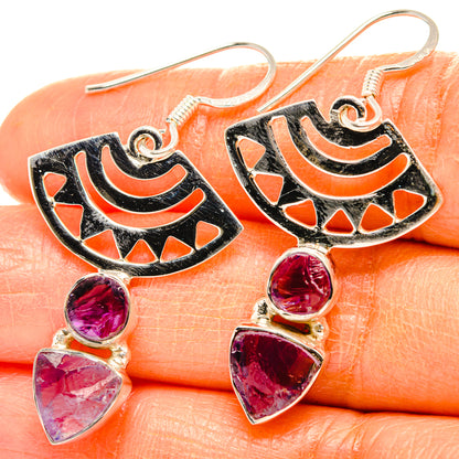 Sterling silver drop earrings with rough amethyst stones and black enamel teardrops