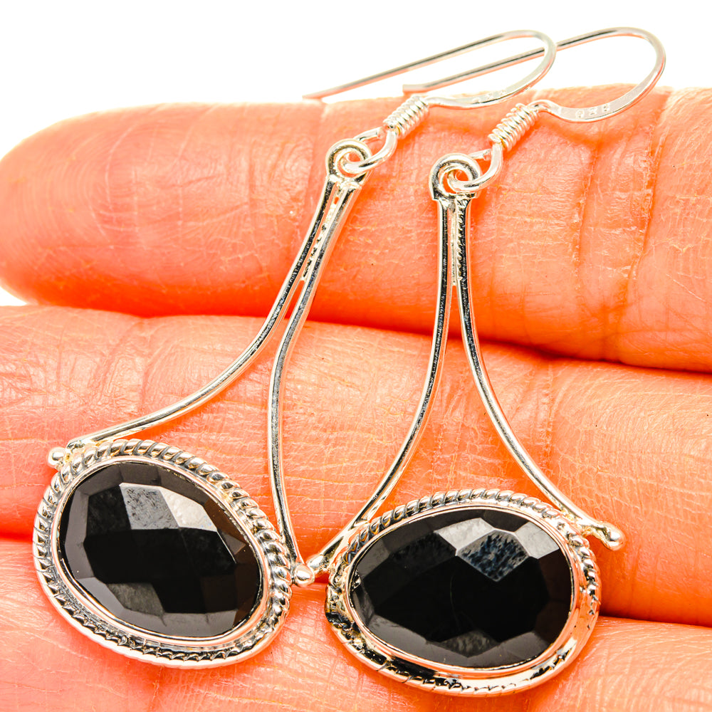 Sterling silver drop earrings with black faceted onyx teardrop stones