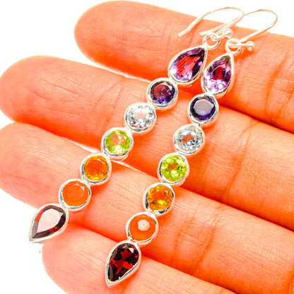 Sterling silver rainbow chakra teardrop earrings with multicolor stones on fishhook closures