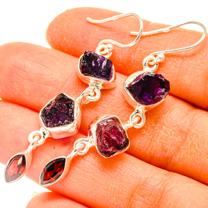 Sterling silver drop earrings with rough dark purple stones and red garnet teardrops