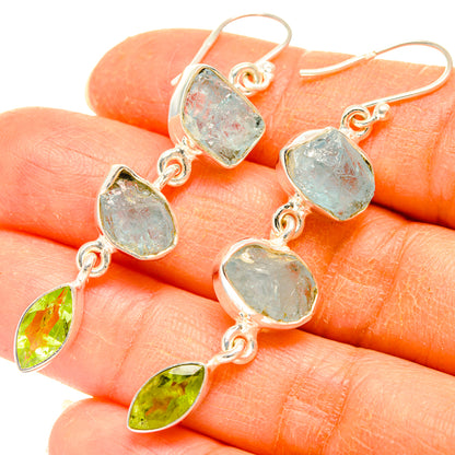 Sterling silver dangle earrings with rough aquamarine and green peridot drop accents