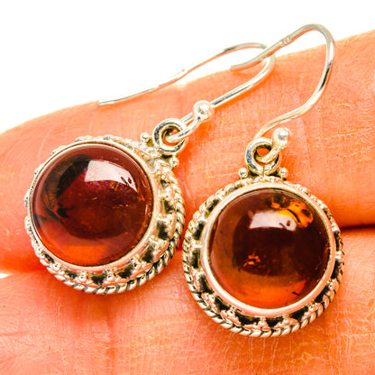 Baltic amber dangle earrings, round dark-red stones in ornate 925 sterling silver frames