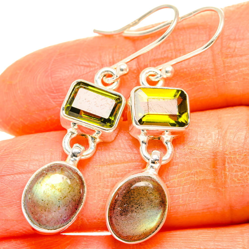 Sterling silver drop earrings with green square peridot and iridescent oval labradorite