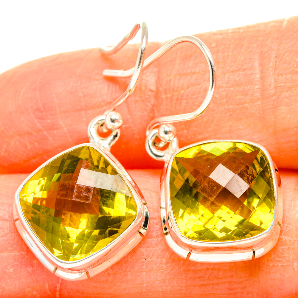 Sterling silver lemon quartz teardrop drop earrings with cushion-cut yellow-green stones